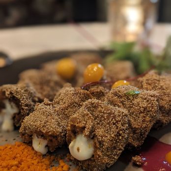 Bungalow signature dishes Shrimp Balchao ConesSpice Roasted PineappleYogurt Kabab
